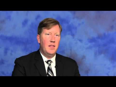 What is an acceleration clause in a commercial lease